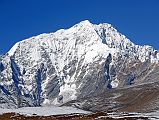 16 Pemthang Karpo Ri Close Up As Trek Nears Shishapangma Advanced Base Camp Pemthang Karpo Ri (6830m, also called Dome Blanc) close up as the trek nears Shishapangma Southwest Advanced Base Camp. The first ascent of Pemthang Karpo Ri was made by the Swiss Raymond Lambert, Ang Norbu Sherpa, Kami Tshering Sherpa, Pasang Sherpa, and Pemba Gyaltzen Sherpa on May 13 (14?), 1955, climbing from the south.